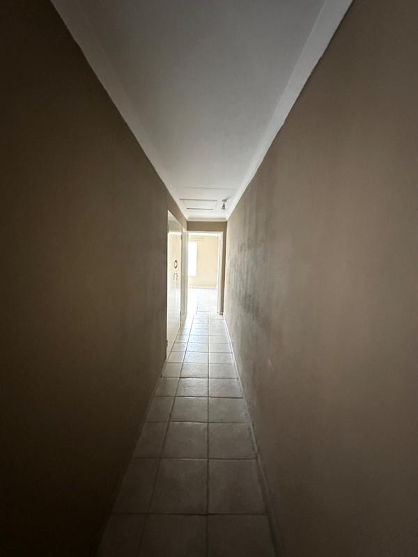 15596076